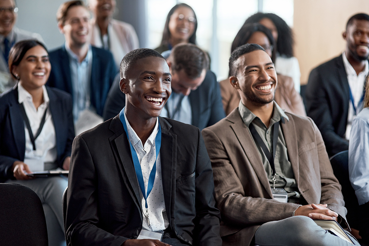 Shot of a group of businesspeople attending a conference.